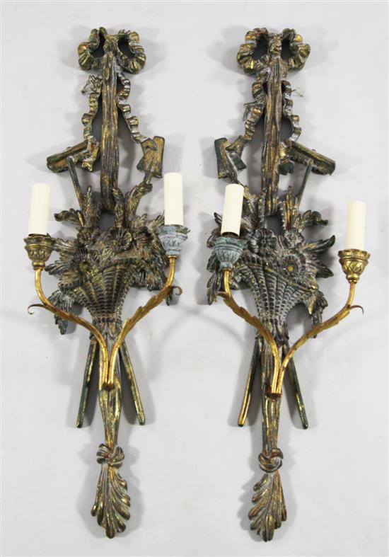 Pair of modern carved and painted wall sconces(-)